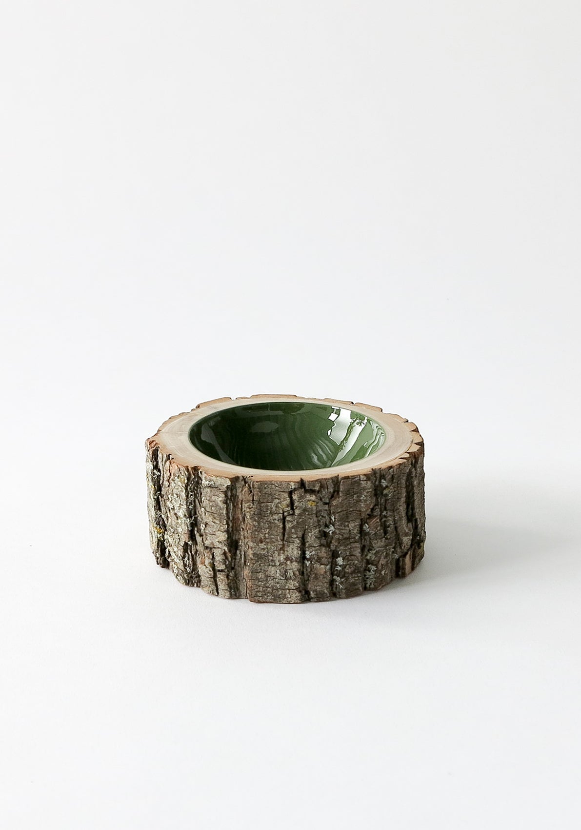 Size 5 Log Bowl - medium wooden bowl with rough bark, glossy interior is a rich olive green colour.
