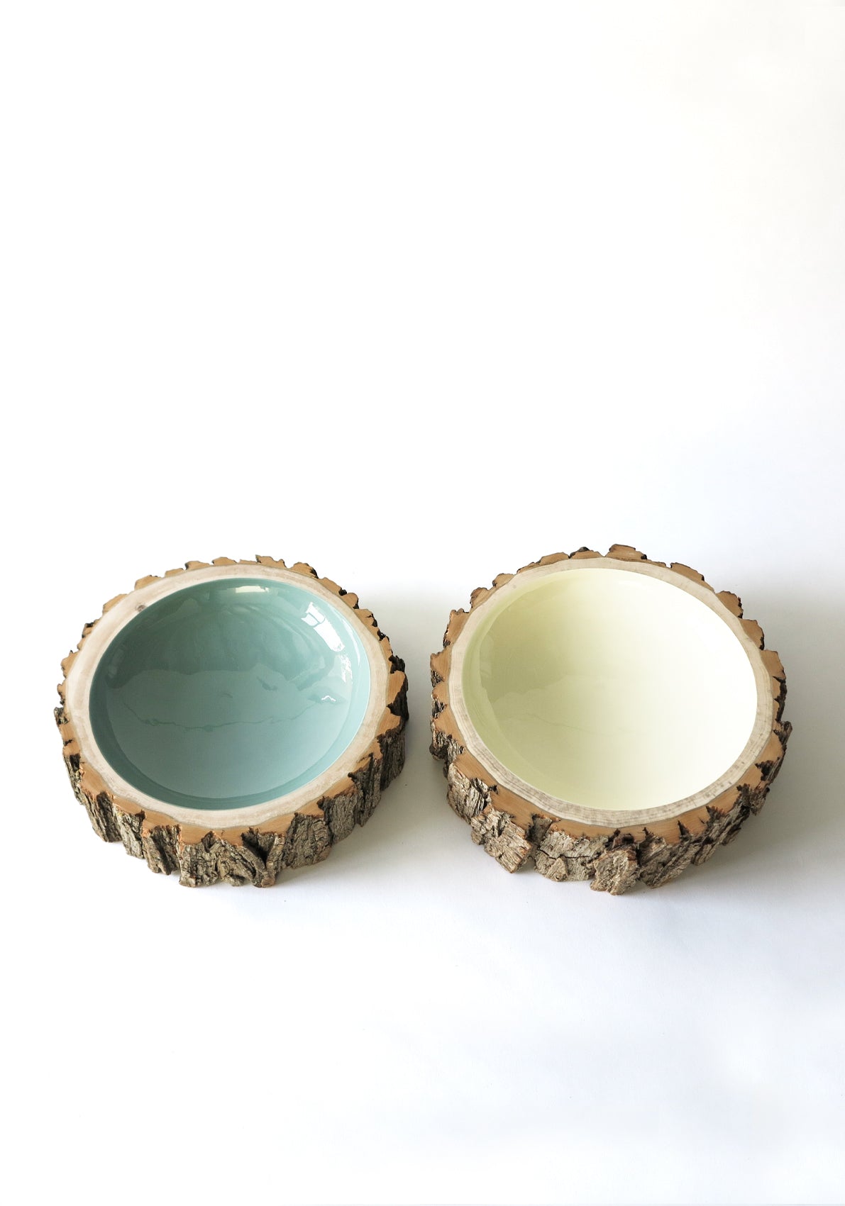 Size 11 Log Bowl - Two Extra Large Wooden Bowl with rough bark, glossy interiors are a pale green/blue sage and an off white creme.