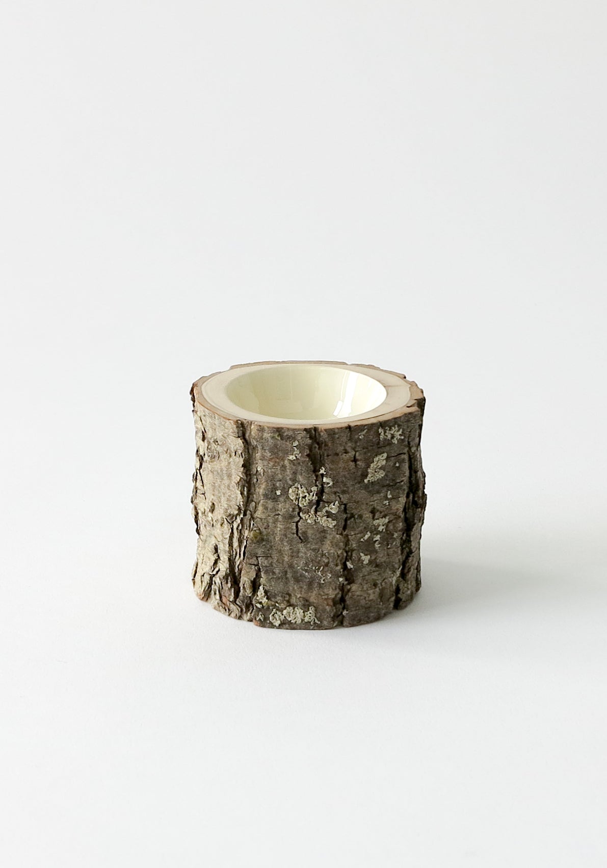 Extra Small wooden bowl with rough bark, glossy interior is s creamy white colour.