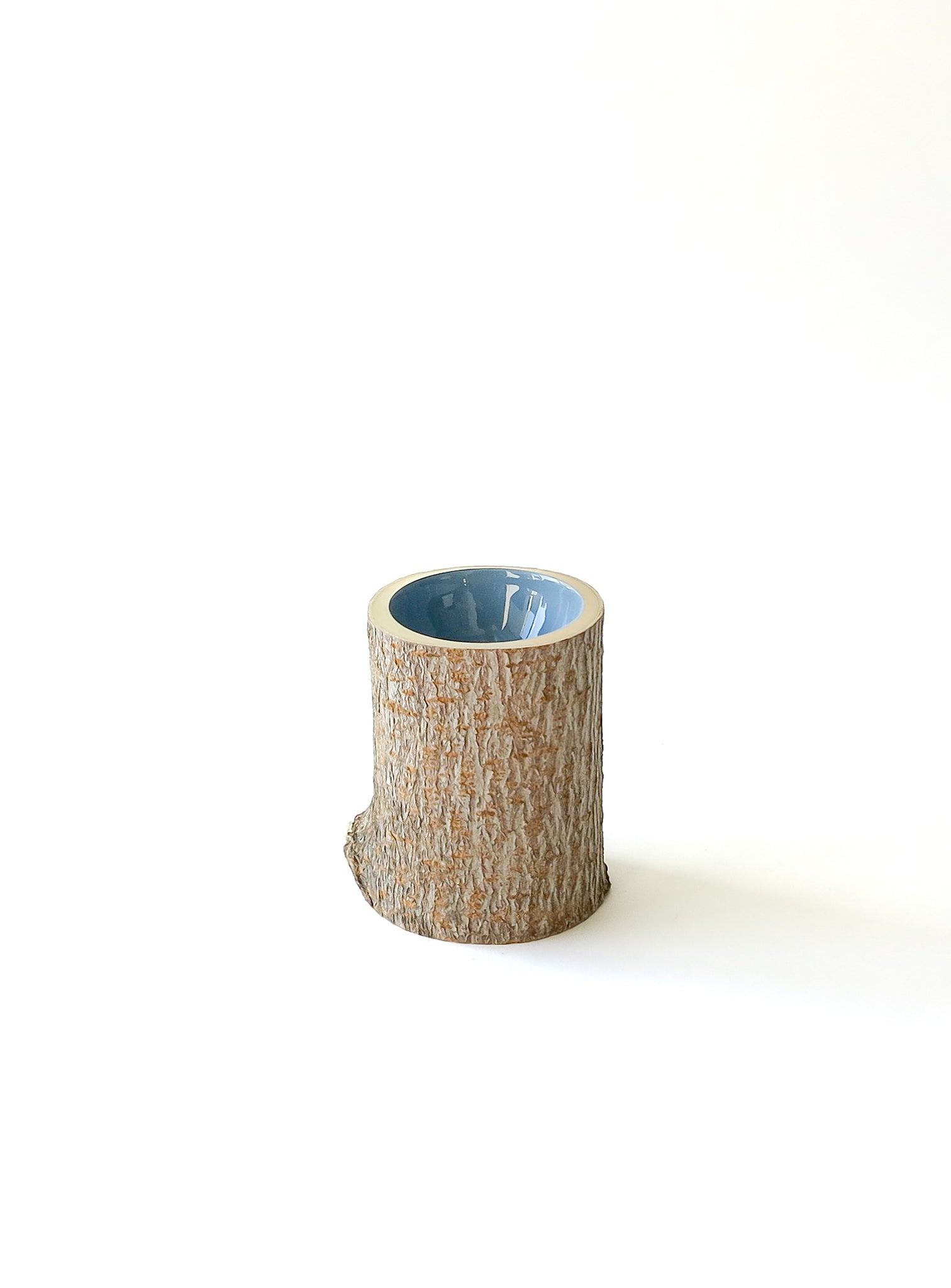 Size 2 Log Bowl - extra small wooden bowl with rough bark, glossy interior is a dusty denim blue colour.